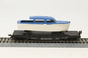 0801200 Lionel Ho 40ft Black Flat Car With Blue Boat Seaboard Sal