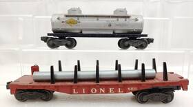 6511-6465 Lionel 2 Trains Postwar Freight Cars 6511 Pipe Car 6465 2d Sunoco Tank