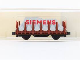 51326600 Minitrix N Unlettered Brown Stake Flat Wagon With Siemens Covered Load