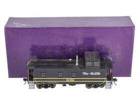 01453 Woosung O Brass Rio Grande Riveted Caboose 2 Rail - Painted/box