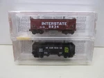 MICRO-TRAINS-#87012-INTERSTATE-2-BAY HOPPERS-2-PACK-N- Scale. Fixed Price $30.00.