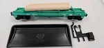 Lionel 6-9300 Penn Central Operating Log Dump Car Guage. Fixed Price $12.00.