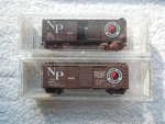 Scale Pair Of Micro Trains Northern Pacific 40' Standard Boxcars #22040. Fixed Price $29.99.