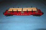 Lionel #6264 Flat Car With 12 Timbers Use #264 Operating Forklift. Fixed Price $44.95.