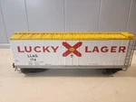 Atlas 2001142-1 40' Plug Door Boxcar Lucky Lager Beer Rd# 174 3RL New. Fixed Price $35.01.