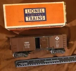 Post War Lionel Gauge Erie Rr X6454 Brown Boxcar. Fixed Price $25.00.