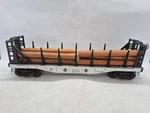 Lionel Gauge Atsf #94283 Bulhead Flatcar W/removable Stakes + Logs. Fixed Price $19.99.
