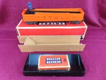 Lionel Postwar 3562-75 Orange Operating Barrel Car Boxed 1957. Fixed Price $109.95.