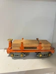 Prewar American Flyer #3046 (d) Orange Flatcar W/ Lumber 8WHL Rubber Stamped. Fixed Price $150.00.