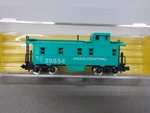 Atlas # 3584 Penn Central Caboose 29854 Scale. Fixed Price $16.00.