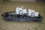 Lionel Flatcar With Corgi Triple Crown Trucks 6-17515. Fixed Price $54.99.
