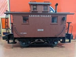 Lionel 2226700 Lehigh Valley Bobber Caboose W/ Interior Lights And Figure #2606. Fixed Price $104.95.