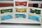 7-VINTAGE Ho Lionel Cars And 1-BACHMANN W/box. Fixed Price $75.00.