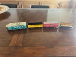 Tin Litho 4 Car Train Set (marx) Locomotive Railroad & Wabash Penn Nyc. Fixed Price $30.00.
