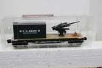 Menards 10-1/2" Gauge Military Flatcar With Container And Gun. Fixed Price $44.95.