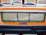 Lionel Trains 9823 Bc Rail Bulkhead Flat Car W' Cutwood Load 6-16982. Fixed Price $35.00.