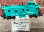 Atlas 3584 N-scale Penn Central Caboose #29854. Fixed Price $9.99.