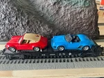 Lionel Gauge 3950 Flat Auto Carrier With Three Porsche Cars. Fixed Price $21.37.