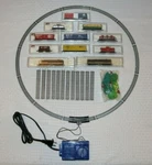 Life-like / Atlas Scale 11 Locomotive & Train Cars, Plus Track And Transformer. Fixed Price $174.95.