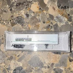Micro-trains Line Scale Seattle White Freight Car Adjustable Wheelbase 1:160. Fixed Price $39.95.