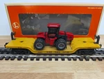 Lionel 6-16957 Depressed Flatcar W/ertl Case 4WD Tractor. Fixed Price $24.95.