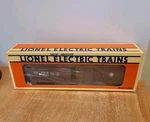 Lionel Electric Trains #6-1614 Erie Stock Car Opening Doors Box 1995. Fixed Price $28.00.