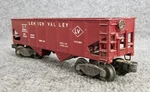 O-27 Scale Post War Lionel Lehigh Valley Bay Hopper Car #25000 Red Version. Fixed Price $14.95.