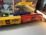 Gauge- Menards M&m's Red,yellow, Blue Boxcars- L2371. Fixed Price $118.88.