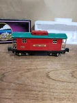 Tinplate Traditions By Mth Electric Trains No 817 Caboose. Fixed Price $87.00.