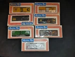 Lot Of 7 American Flyer 's' Gauge Rr Cars: Nib. Fixed Price $250.00.