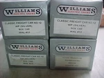 4 Sealed Williams WAL#12 Western Pacific Boxcar WP1988 Orange Feather. Fixed Price $140.00.
