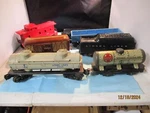 Various Antique Lionel Marx O-gauge Train Parts 2 Metal 5 Plastic. Fixed Price $75.00.