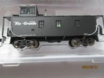 Trainworx # 31499-03 Un-numbered Rio Grande Caboose Black. N-scale. Fixed Price $59.95.