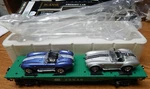 K-line K661-1871 Penn Flat Car W/2 Die Cast 64 Shelby Cobras Used W/box Scale. Fixed Price $50.00.