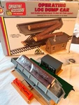 70S Vintage - Ahm Ho Scale Operating Log Dump Car W/ Lighted Bldg (no. 11011). Fixed Price $17.00.