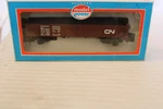 Ho Scale Model Power 40' Gondola With Load, Canadian National, Brown, #70450. Fixed Price $20.00.