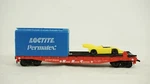 Ahm Ho Scale Flat Car W/ Indy Race And Loctite Permatex Container B85. Fixed Price $9.95.