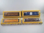 (4) New Life-like Ho Scale Cars # 8482, 8990, 8528, 8533 In Boxes. Fixed Price $34.30.