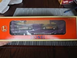 Lionel #16757 Johnny Lightning Display Boxcar By Eastwood. Fixed Price $25.00.