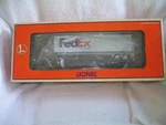 Lionel Flatcar With Federal Express Trailer 6-19440 New In The Box Plastic Wrap. Fixed Price $29.00.