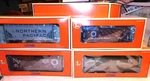 Lionel Gauge #6-11977 Northern Pacific 4-PACK Freight Cars, New. Fixed Price $151.99.