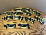 Micro Scalextric/ Hornby 12 Slot Car Curved Tracks 1:64. Fixed Price $19.99.