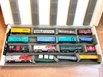 Vintage Lot Of Sixteen Assorted Tyco Ho Scale Model Train Rail Cars & Locomotive. Fixed Price $165.00.
