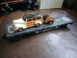 Lionel 6-17549 Route 66 Series Flatcar W/ford Woody Wagon And Trailer Used. Fixed Price $28.00.