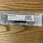 Scale Micro-trains #021 00 390 Nebraska State Car 40' Plug Door Box. Fixed Price $15.99.