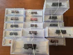 Selection Of 15 Different Bachmann Scale Ore And 55 Ton Freigt Cars, Priced. Fixed Price $17.80.