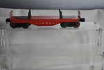 Lionel Postwar 6121, Lines Red Flat Car (metal), 1956-1957. Fixed Price $20.00.