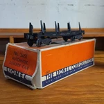 Lionel Lines No. 3451 Gauge Automatic Unloading Lumber Car Black & Box. Fixed Price $60.00.
