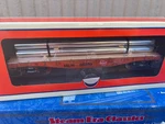 Lionel # 6-27824 Scale Milwaukee Flat Car & Load Of Pipe 86559. Fixed Price $32.63.