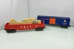 2PC Lionel Gauge Red Erie Animated Gondola Car 9307 & Blue Box Lc 6464-97. Fixed Price $44.95.